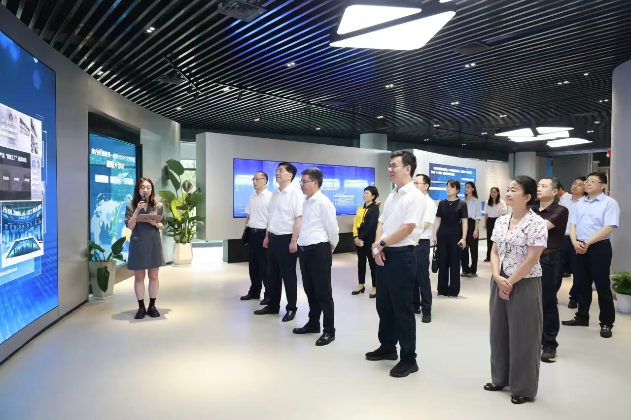 浙江省人大常委会副主任暨军民一行莅临伟德国际1946调研